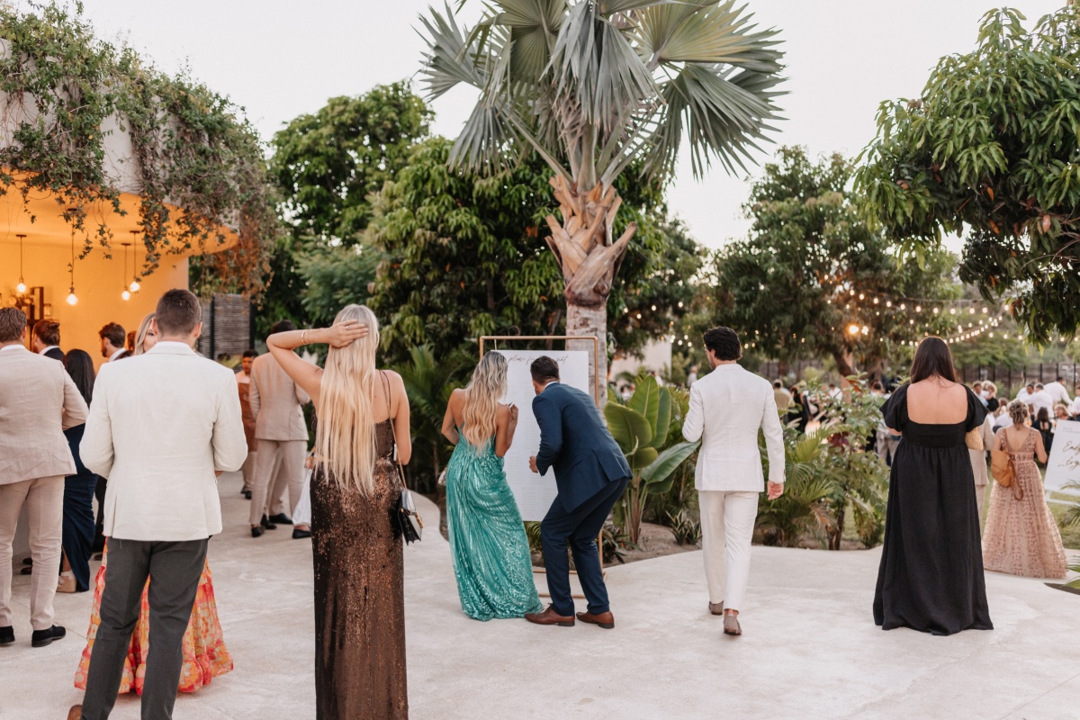 Guests enjoying the cocktail hour at Emily and Lloyd's Cabo wedding