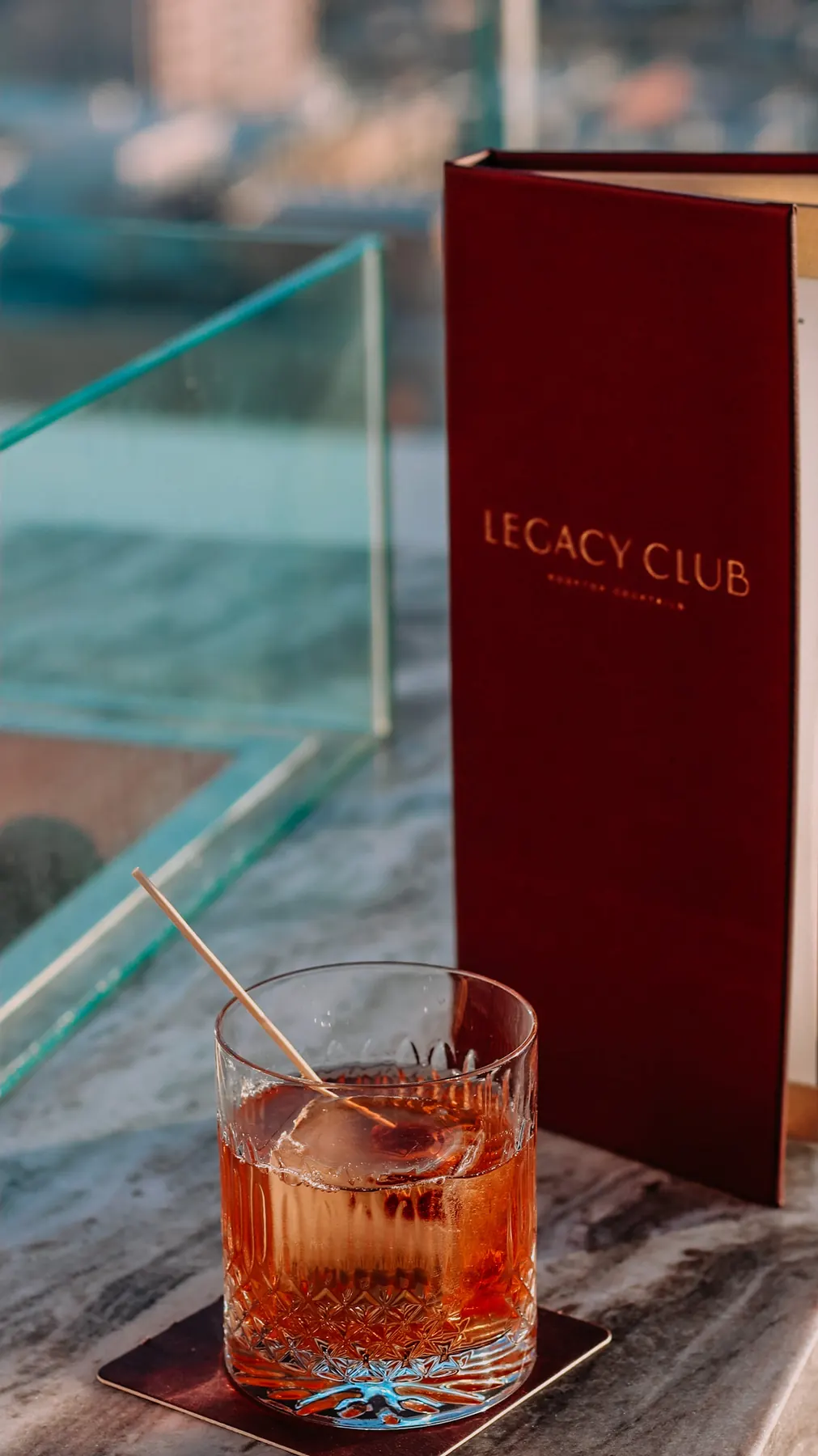 Cocktail reception with skyline views at a wedding venue