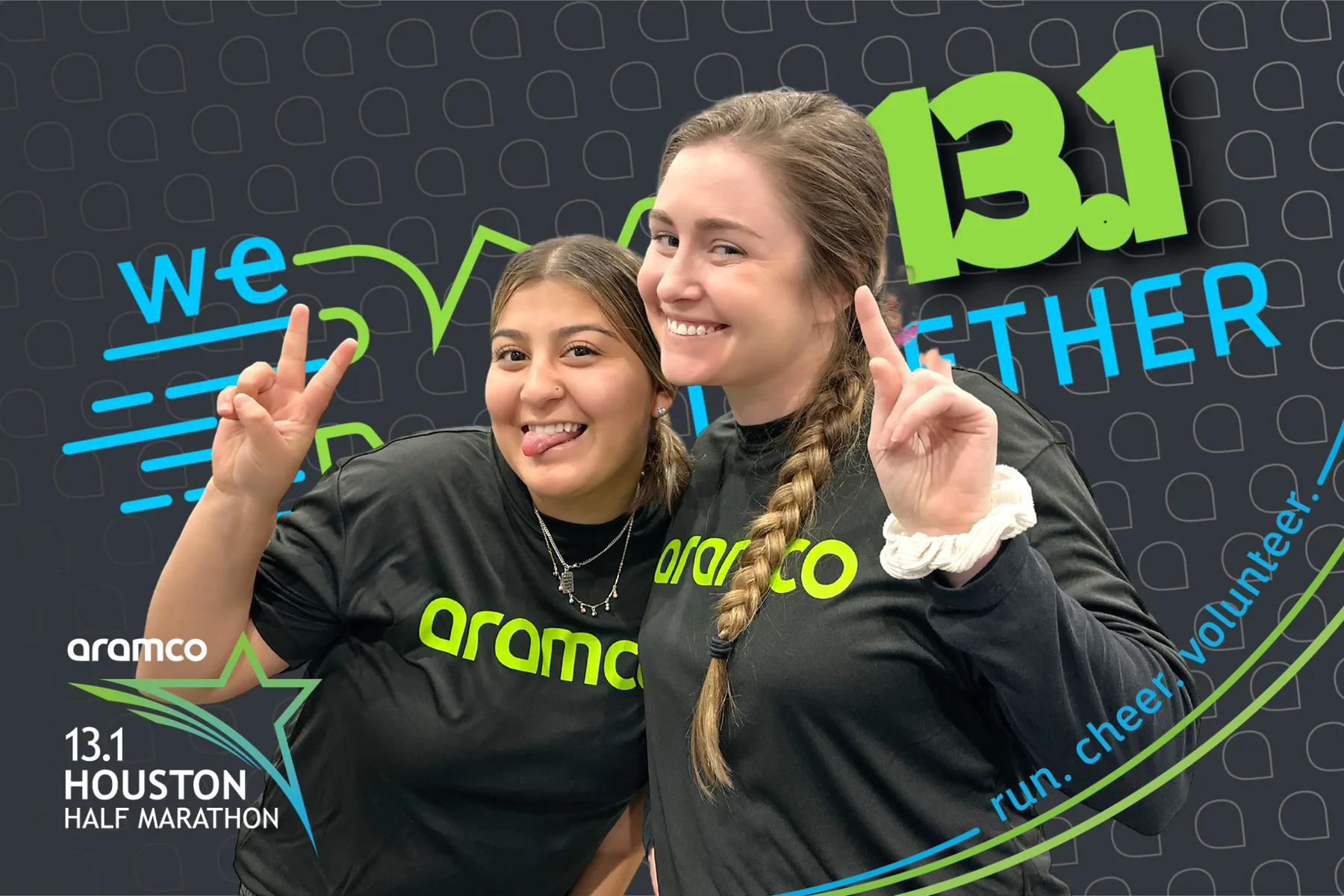 Two volunteers with AI-generated Aramco branded backdrop
