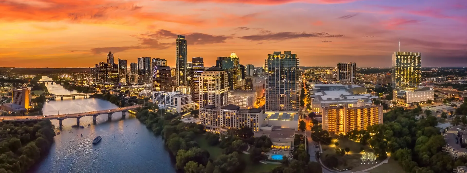 Austin, Texas downtown skyline at sunset over Lady Bird Lake
